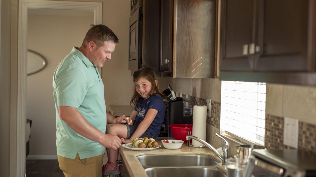 Preparing dinner at the sink